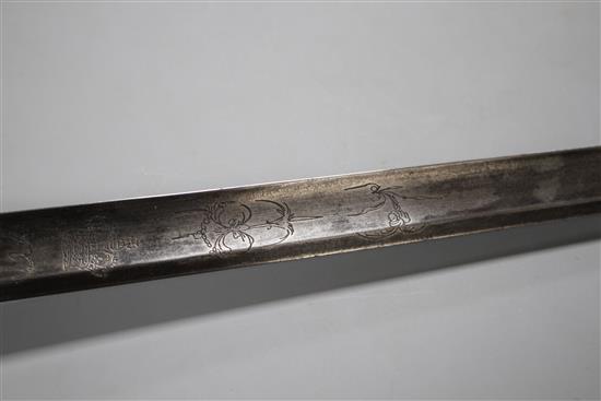 A Georgian infantry officers sword, fine gilt hilt, folding guard, the blade etched GR and Royal Arms, blade 82.5cm, overall length 99